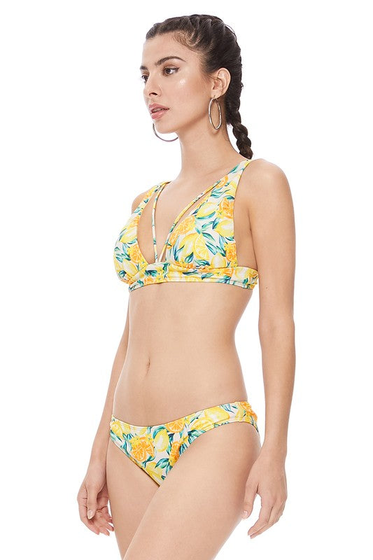 TEXTURED LEMON PRINT BIKINI SETLemon print halter two piece style features strappy details in the front, removable pads, adjustable shoulder straps, hook at back, and full coverage bottom. Texture