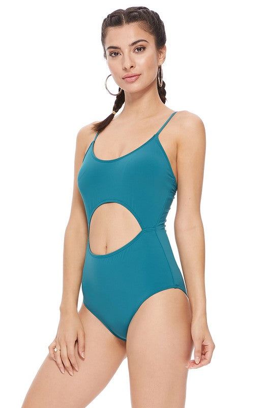 SOLID CUTOUT ONE PIECE SWIMSUITSolid over the shoulder one piece swimsuit with removable pads, adjustable shoulder straps, and cutouts at front. Super soft microfiber materials, stretch fit.
Style