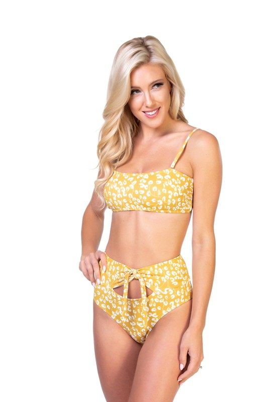 YELLOW FLORAL BANDEAU BIKINI SETNew yellow floral bikini set featuring basic bandeau top with removable and adjustable shoulder straps, removable pads, and back hook closure. Moderate coverage high