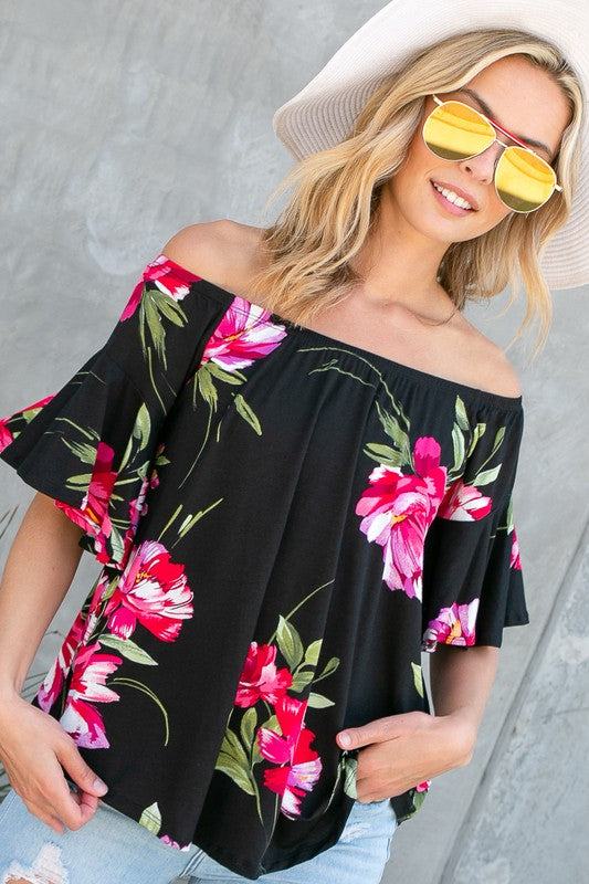 FLORAL OFF SHOULDER TOPFLORAL PRINT JERSEY ELASTICIZED OFF SHOULDER TOP- Floral off shoulder top- Elasticized off shoulder neckline- Ruffle short sleeves- Loose fit- Allover floral print j