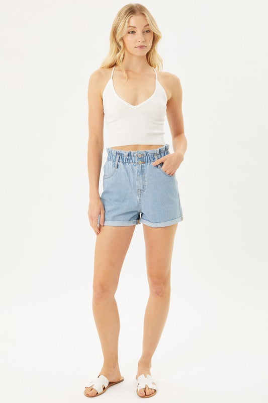 Double Buttoned Waistband Denim ShortsThe Double Buttoned Waistband Denim Shorts are a stylish and comfortable addition to your wardrobe. Featuring a unique double-button closure and a charming ruffled w