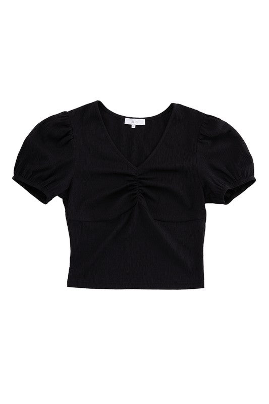 Shirred V neck top with puff sleeves- Shirred V neck top with puff sleeves- Pattern type : solid- Neck line : V neck- Sleeve type : puff sleeves- Sleeve length : short sleeves- Stretch : stretch- Sheer