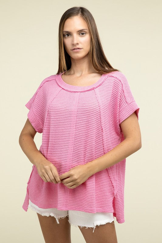 Brushed Waffle Exposed-Seam Short Sleeve TopElevate your casual wardrobe with this Brushed Waffle Top, featuring side slits, exposed seam details, and a stylish hi-low hem. Perfect for a relaxed yet trendy loo