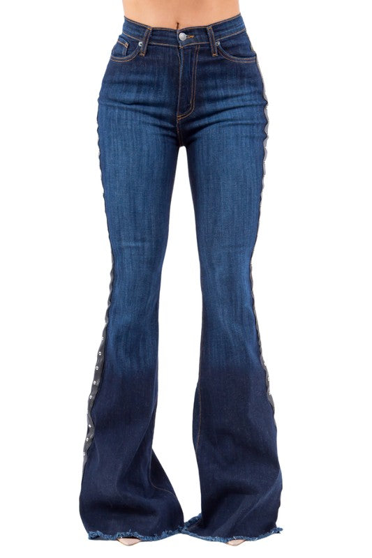 Ropin Bell Bottom Jean- Inseam 32Put on a show with our Ropin' Bell bottom Jean! These jeans have front and back pockets, a front zipper and button, stud accents on the side, and a frayed hem in Dar