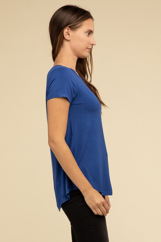 Flowy Round Hem Rayon Short Sleeve TopThe Flowy Round Hem Rayon Short Sleeve Top is the perfect addition to your casual wardrobe. Crafted from soft, lightweight rayon, this top features a relaxed fit and