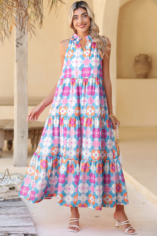 Sky Blue 60s Flower Split Neck Sleeveless Tiered Maxi DressMaterial:100%Polyester

• Enjoy the cool comfort of sleeveless styling, perfect for sunny days and warm evenings, while the tiered maxi skirt adds a whimsical flair