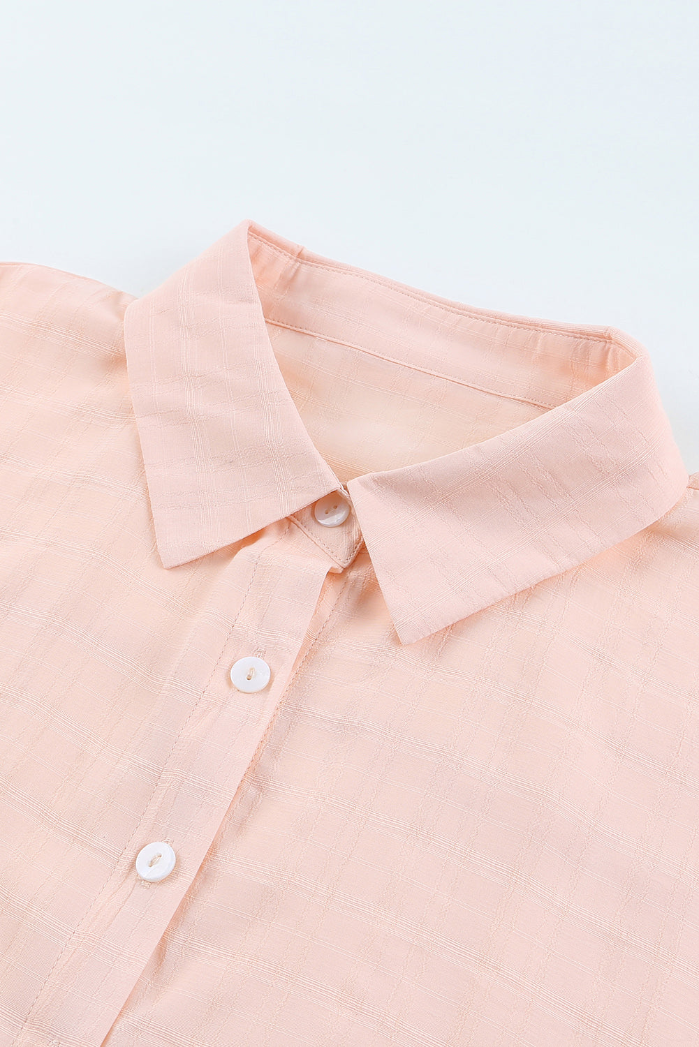 Pink Half Sleeve Collared Button Up BlouseMaterial:100%Polyester



		It features a flattering high-low hemline for a stylish touch.
	
	
		The collared design adds a touch of sophistication.
	
	
		Th