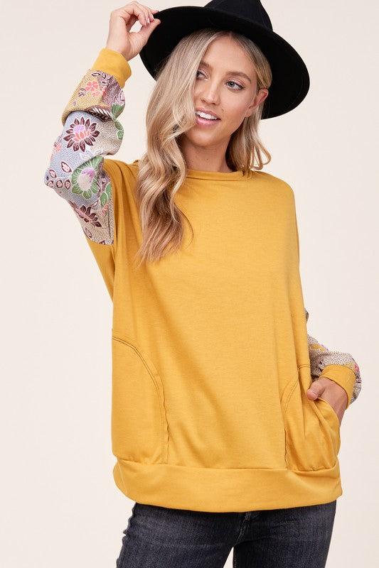 WOVEN FLORAL MIXED TOPFRENCH TERRY SOLID AND WOVEN FLORAL PRINT MIXED LONG SLEEVE SIDE POCKET RAW EDGE DETAIL TOP - MADE IN U.S.A.
Style: Casual
Print / Pattern: SOLID AND WOVEN FLORAL 
F