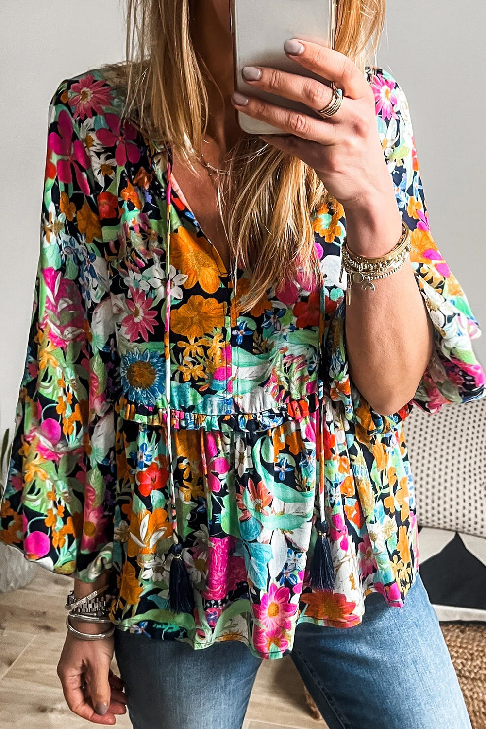 Multicolour Boho Floral V Neck Lantern Sleeve BlouseMaterial:100%Polyester

• Embrace boho-chic vibes with our blouse, featuring vibrant hues and a tie front design for a stylish look.
• The lantern sleeves add a to