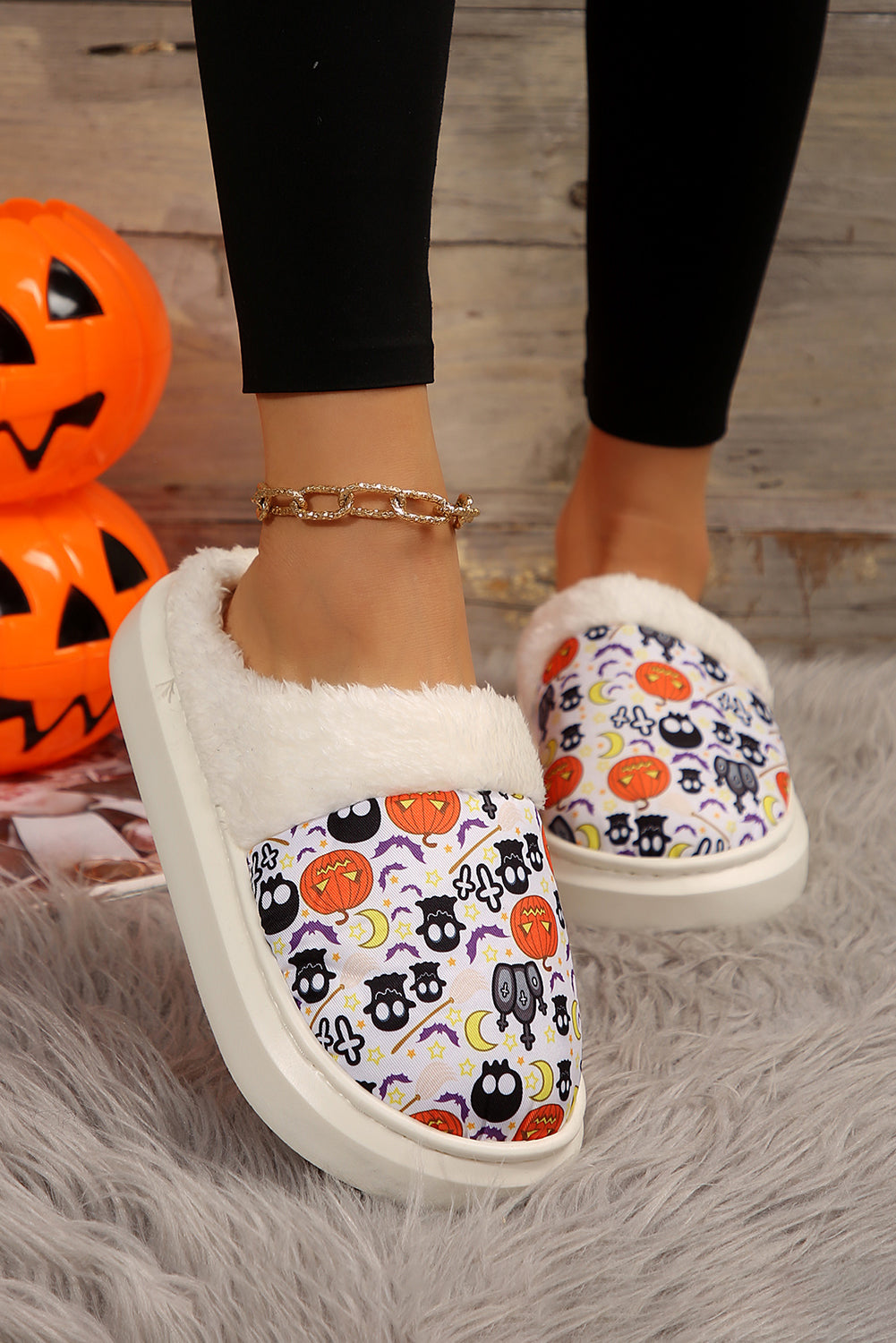 White Halloween Pumpkin Ghost Print Plush Home Slippers• Luxuriously soft and cozy, these plush home slippers feature a charming Halloween pumpkin ghost print, perfect for adding a festive touch to your loungewear.
• Th