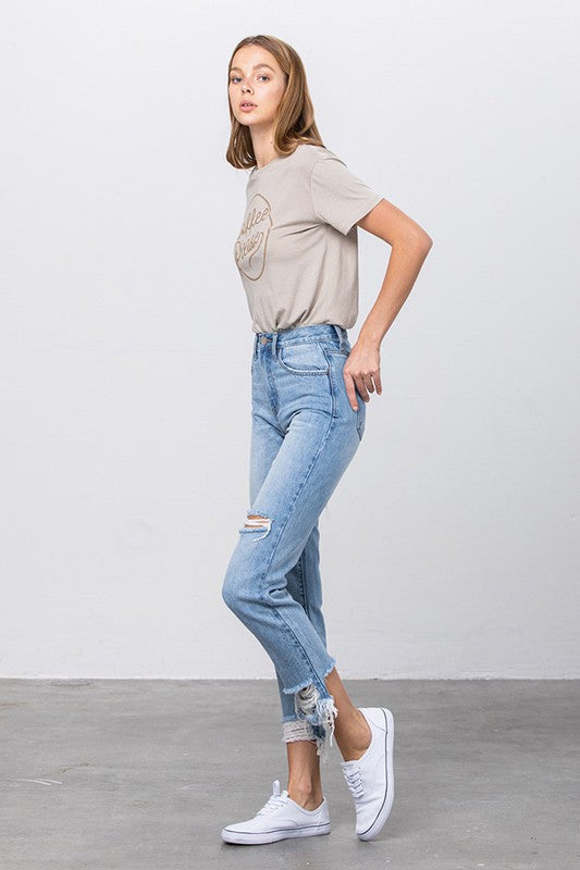 HIGH WAIST TAPERED JEANSHIGH WAIST TAPERED JEANS100% COTTON(SIZE 3)FRONT RISE 11"INSEAM -26 1/2"LEG OPENING - 12 1/4"*Model wears size 3*MODELHEIGHT 5'9"WAIST 24"HIPS 35"BUST 34"SIZE 1-3-5-