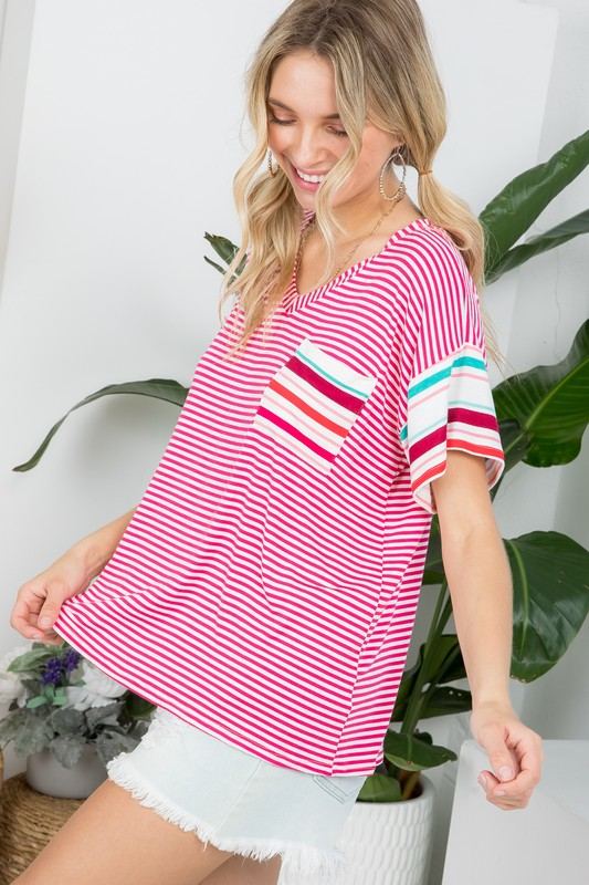 MULTI STRIPE BOXY TOP- Multi stripe boxy top- Pullover short sleeves- V neck chest pocket- Multi stripe jersey - Model is 5' 8" 34-24-34 and wearing a Small- S/M/L 2-2-2- 95% RAYON, 5% S