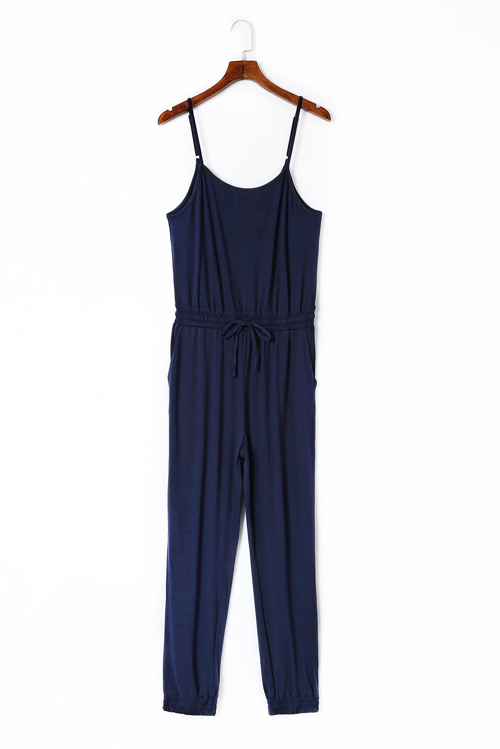 Dark Blue Pockets Drawstring Waist Spaghetti Strap JumpsuitMaterial:95%POLYESTER+5%ELASTANE



		An amazing jumpsuit to make customers feel chic and slim
	
	
		Spaghetti straps design is flirty and sexy
	
	
		Flatter