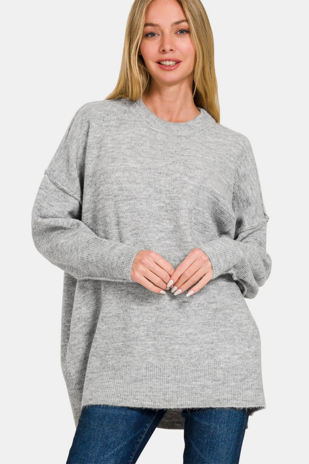 Zenana High-Low Hem Drop Shoulder SweaterThis hi-low hem pocket sweater is crafted from soft and midweight material, making it both cozy and comfortable for everyday wear. The hi-low hem adds a trendy touch