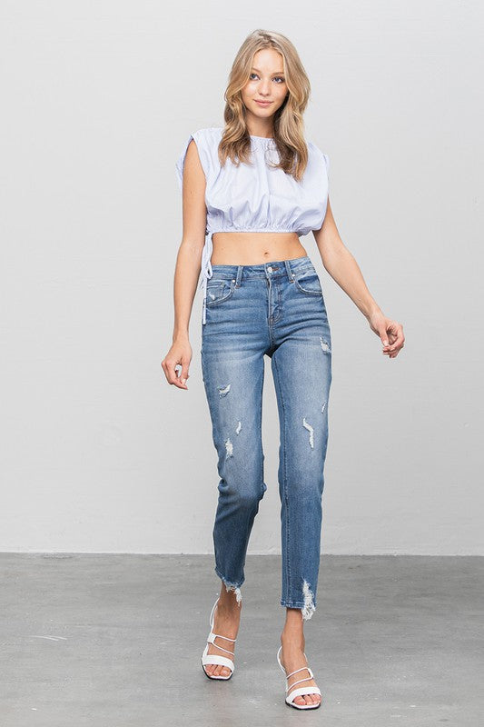 MID RISE SLIM GIRLFRIEND JEANSMID-RISE SLIM GIRLFRIEND JEANS 69.5% COTTON, 27% POLYESTER, 3.5% SPANDEX(SIZE 3)WAIST 25 1/2"HIP 32 1/2"FRONT RISE 9 1/2"LEG OPENING 12"INSEAM 27 1/2"*Model wears si