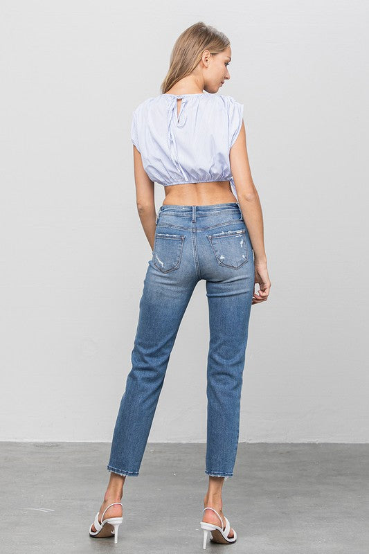 MID RISE SLIM GIRLFRIEND JEANSMID-RISE SLIM GIRLFRIEND JEANS 69.5% COTTON, 27% POLYESTER, 3.5% SPANDEX(SIZE 3)WAIST 25 1/2"HIP 32 1/2"FRONT RISE 9 1/2"LEG OPENING 12"INSEAM 27 1/2"*Model wears si