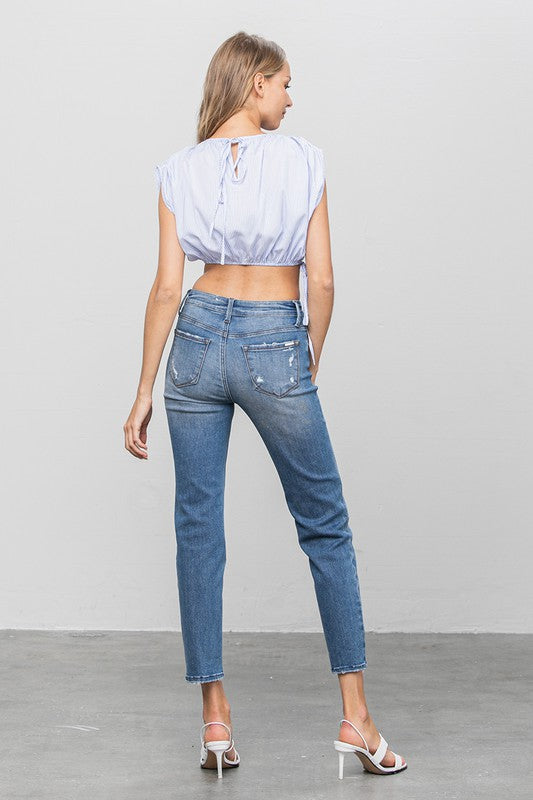 MID RISE SLIM GIRLFRIEND JEANSMID-RISE SLIM GIRLFRIEND JEANS 69.5% COTTON, 27% POLYESTER, 3.5% SPANDEX(SIZE 3)WAIST 25 1/2"HIP 32 1/2"FRONT RISE 9 1/2"LEG OPENING 12"INSEAM 27 1/2"*Model wears si