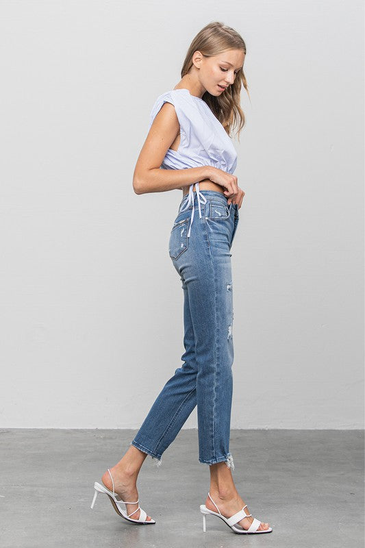 MID RISE SLIM GIRLFRIEND JEANSMID-RISE SLIM GIRLFRIEND JEANS 69.5% COTTON, 27% POLYESTER, 3.5% SPANDEX(SIZE 3)WAIST 25 1/2"HIP 32 1/2"FRONT RISE 9 1/2"LEG OPENING 12"INSEAM 27 1/2"*Model wears si