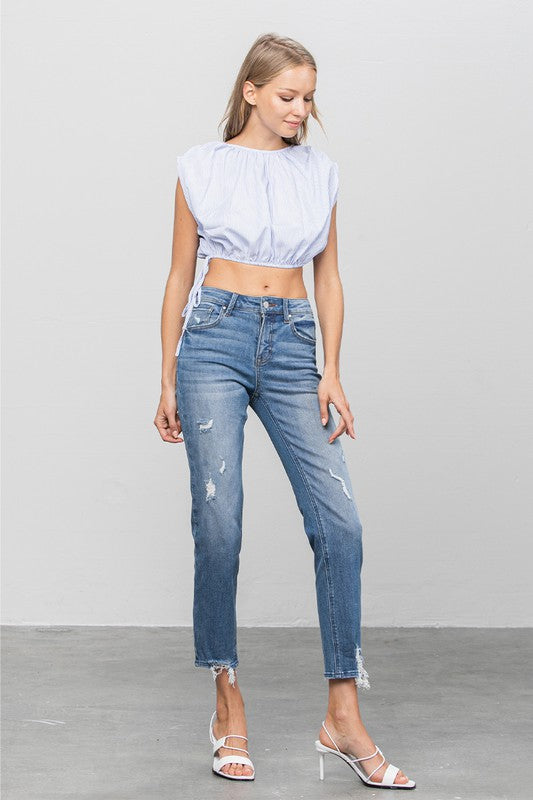 MID RISE SLIM GIRLFRIEND JEANSMID-RISE SLIM GIRLFRIEND JEANS 69.5% COTTON, 27% POLYESTER, 3.5% SPANDEX(SIZE 3)WAIST 25 1/2"HIP 32 1/2"FRONT RISE 9 1/2"LEG OPENING 12"INSEAM 27 1/2"*Model wears si