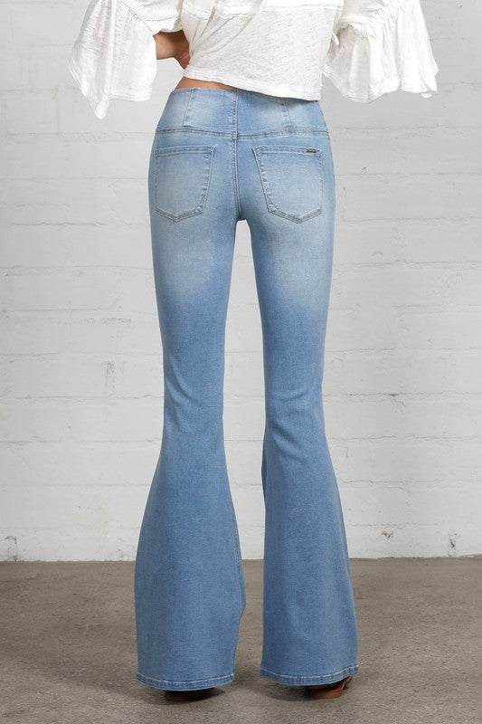 Mid Rise Banded Wide Flare JeansMid Rise Banded Wide Flare Jeans- 68% Cotton, 28% Polyester, 2% Rayon, 2% Spandex- Stretch Denim- Wide Flare Leg- Imported, Designed In USASize S- Waist 26 1/2"- Hip