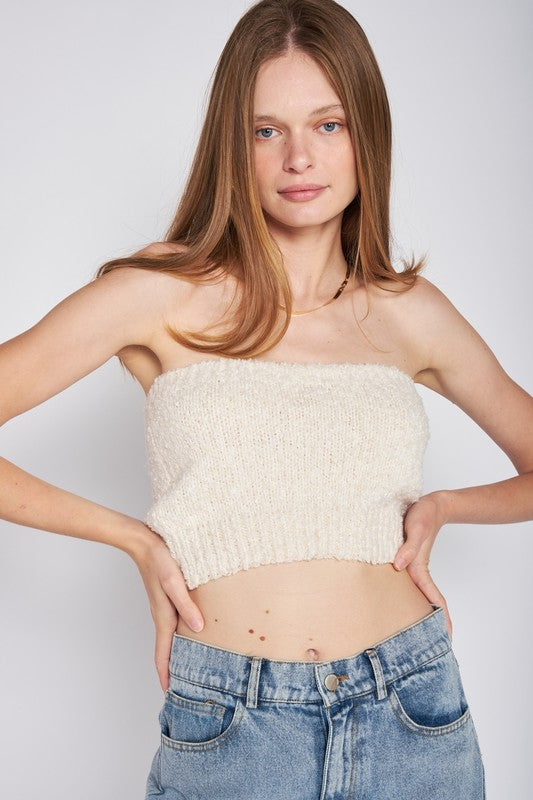 ELASTIC WAISTBAND FRINGED TUBE TOPSIZE &amp; FIT :Model Wears Size SmallModel's Height: 5'9Made In: IMPORTEDFabric Contents: 100% Polyester