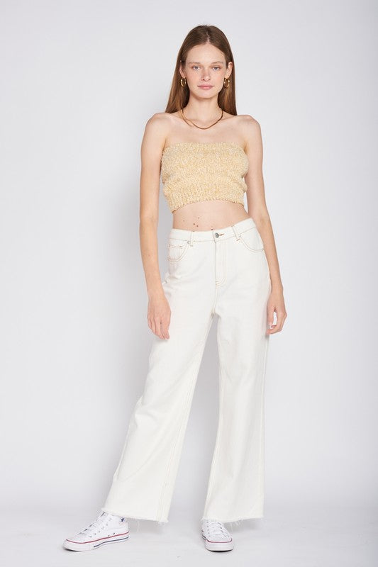 ELASTIC WAISTBAND FRINGED TUBE TOPSIZE &amp; FIT :Model Wears Size SmallModel's Height: 5'9Made In: IMPORTEDFabric Contents: 100% Polyester