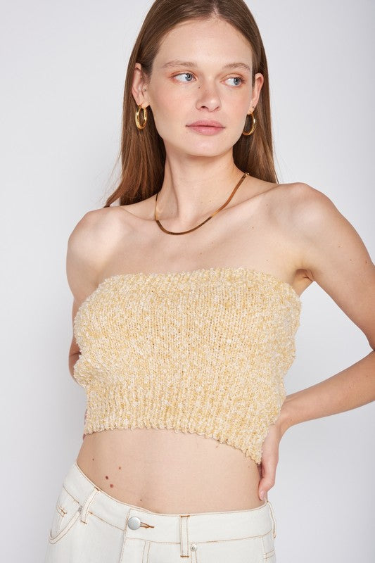 ELASTIC WAISTBAND FRINGED TUBE TOPSIZE &amp; FIT :Model Wears Size SmallModel's Height: 5'9Made In: IMPORTEDFabric Contents: 100% Polyester