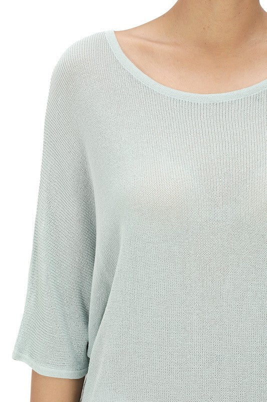 Half Dolman Sleeve Sheer Cool Knit Sweater Top- Length: 22.5-23.5"- Sleeve Length: 20.25-20.75"- Sheer, Semi See Through Loose Fit- Cool Touch, Light Weight Rayon/Nylon Blend with Stretch- Perfect for easy-going