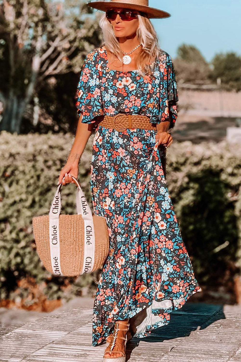 Sky Blue Boho Floral Print Knotted Backless Maxi DressMaterial:100%Viscose



		This is a perfect dress for summer fashion
	
	
		Features a elegant silhouette with flowy sleeves
	
	
		Only the relaxed long dress