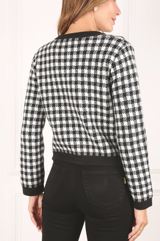 Black check knitted jacket- Black check knitted jacket, heavy weight fabric, 4 snap buttons, 2 functional pockets- Pattern type : check pattern- Neck line : round neck- Sleeve type : regular 