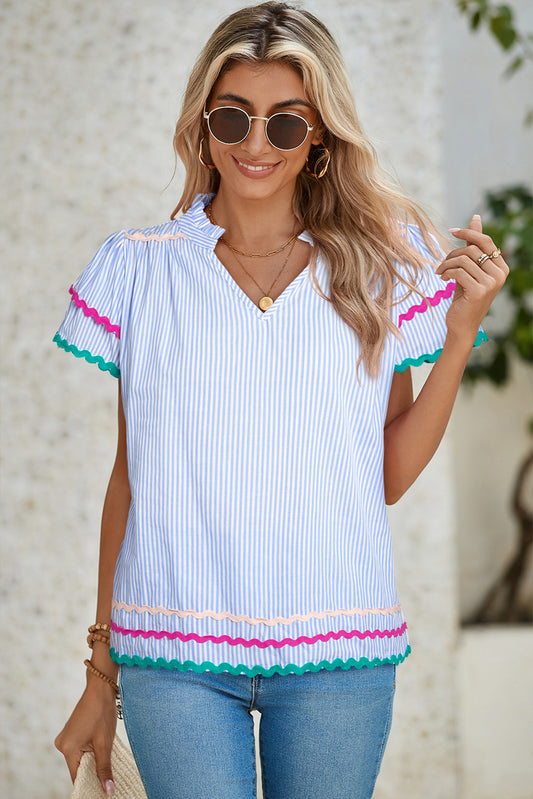 Sky Blue Striped Ricrac Splicing Frill V-Neck BlouseMaterial:100%Cotton



		Playful stripes: This blouse features a fun striped pattern with flirty frill details and a flattering V-neck.
	
	
		Chic and charming: