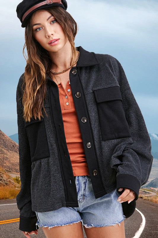 Matilda JacketDaily oversized lightweight jacket with button up front, collared neckline, long sleeves with button cuffs and exaggerated front patch pockets* Having trouble matchi