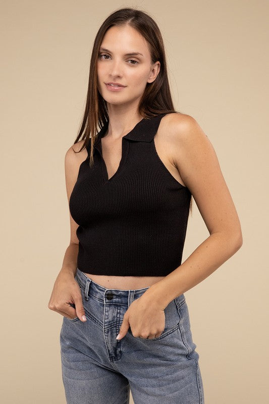 Sleeveless Collared Crop Knit TopThe Sleeveless Collared Crop Knit Top exudes timeless elegance and sophistication. Its tailored design features a classic collared neckline, adding a touch of refine