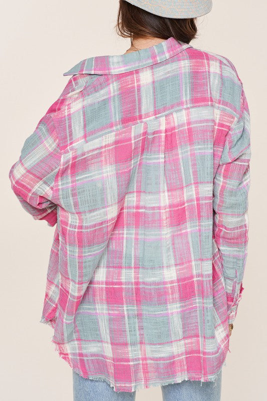 Peony TopOne of our best selling products!Button down shirt with bold plaid print. Relaxed fit with long sleeves. Cut edge detailing for hand cuffs and raw hem.
Style: Casual