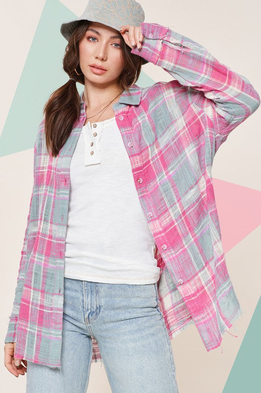 Peony TopOne of our best selling products!Button down shirt with bold plaid print. Relaxed fit with long sleeves. Cut edge detailing for hand cuffs and raw hem.
Style: Casual