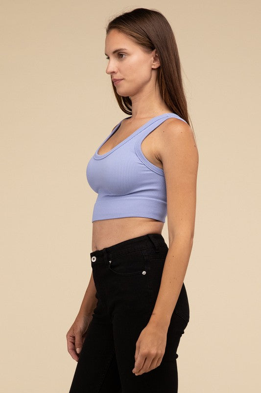 Ribbed Seamless Crop TopElevate your summer essentials with our Ribbed Seamless Crop Top, a versatile piece perfect for layering or wearing solo. Crafted with comfort in mind, it boasts a f