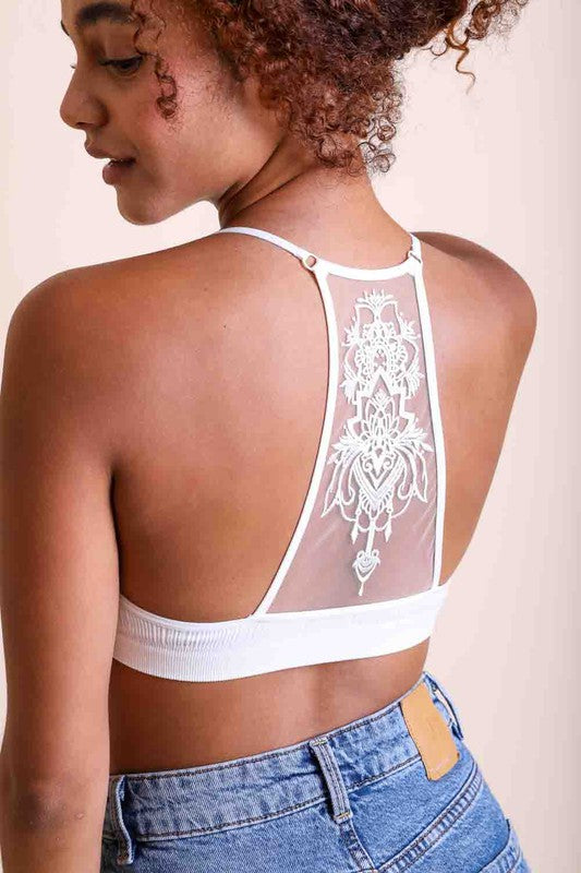 Tattoo Mesh Racerback BraletteTattoo Mesh Racerback BraletteNo Adjustable StrapHeat Stamped Care LabelImmediate ShippingCup Fit XS/S: 32A 32B 32C 34A 34BM/L: 32D 34C 36B 36C 38BModel Measurements