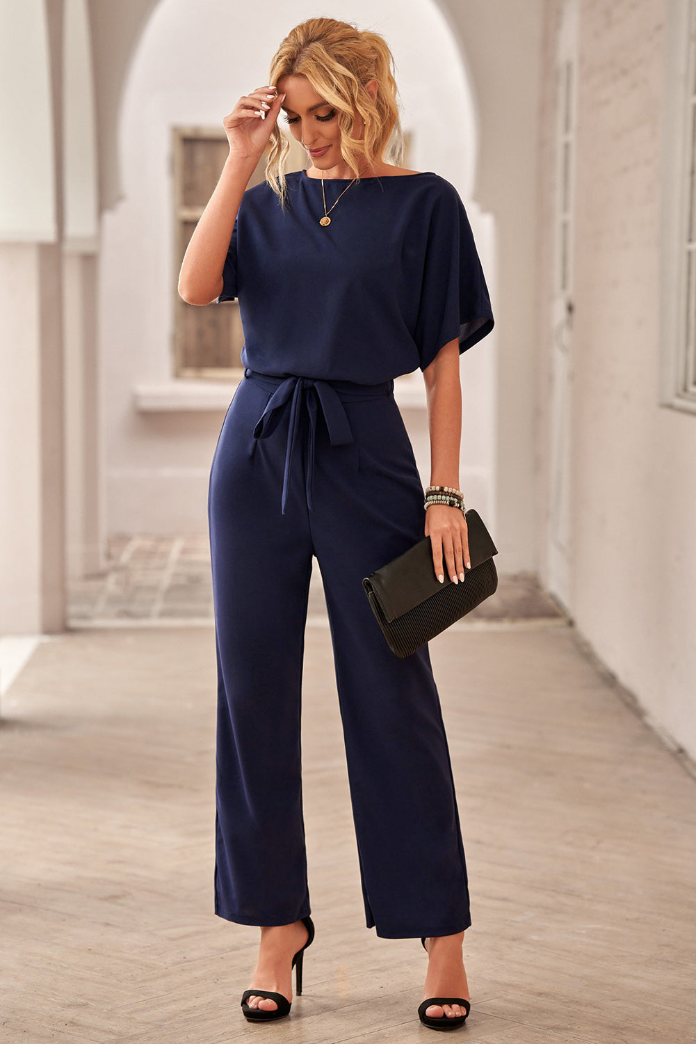 Dark Blue Solid Color Casual Belted Wide Leg JumpsuitMaterial:95%Polyester+5%Spandex



		You'll be looking oh so glam in this beaut jumpsuit
	
	
		A tie waist belt, batwing sleeve and wide leg
	
	
		The loose 