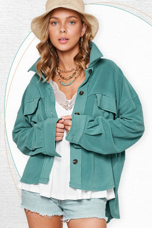 Matilda JacketDaily oversized lightweight jacket with button up front, collared neckline, long sleeves with button cuffs and exaggerated front patch pockets* Having trouble matchi