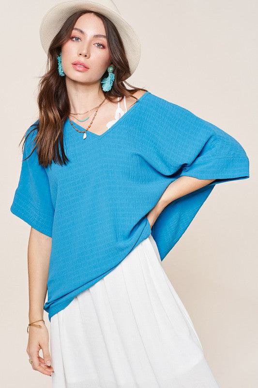 Vanessa TopThe Vanessa Top is the epitome of casual chic. With its oversized fit and v-neckline, it offers a relaxed and comfortable style that's perfect for everyday wear. The