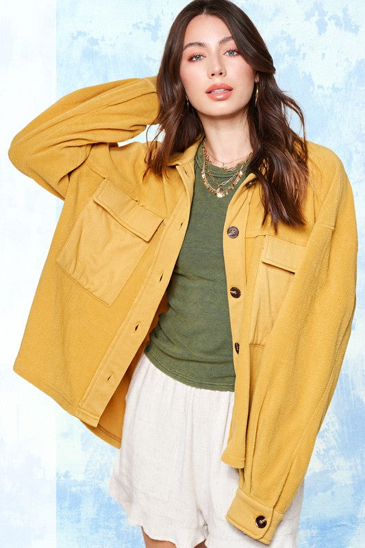 Matilda JacketDaily oversized lightweight jacket with button up front, collared neckline, long sleeves with button cuffs and exaggerated front patch pockets* Having trouble matchi