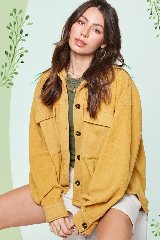 Matilda JacketDaily oversized lightweight jacket with button up front, collared neckline, long sleeves with button cuffs and exaggerated front patch pockets* Having trouble matchi