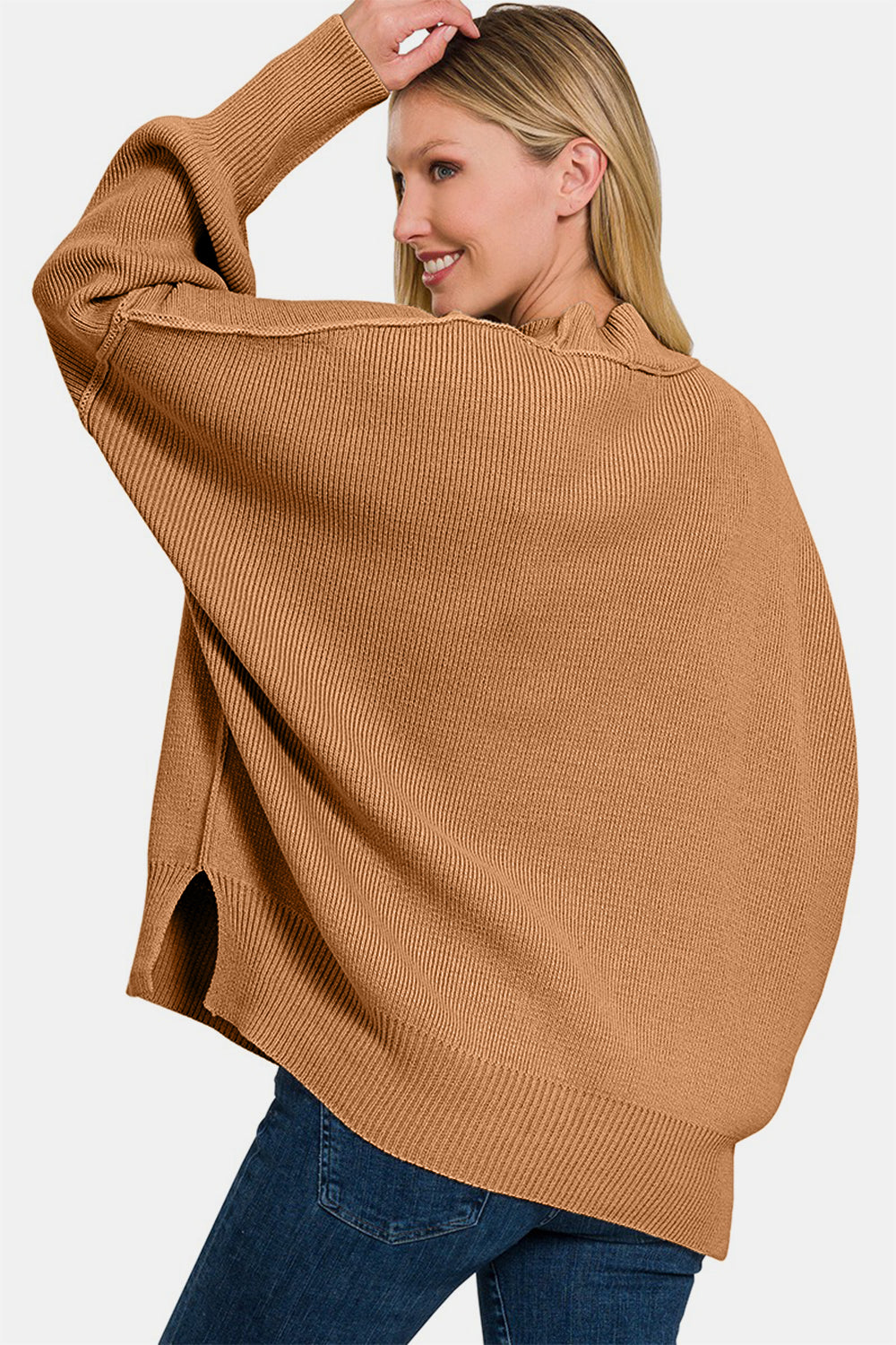 Zenana Side Sit Oversize SweaterSide Slit Oversize Sweater is a trendy and comfortable choice for your casual wardrobe. The oversized fit adds a relaxed and effortless vibe to your outfit. With sid