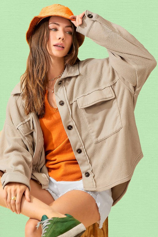 Matilda JacketDaily oversized lightweight jacket with button up front, collared neckline, long sleeves with button cuffs and exaggerated front patch pockets* Having trouble matchi