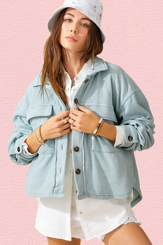 Matilda JacketDaily oversized lightweight jacket with button up front, collared neckline, long sleeves with button cuffs and exaggerated front patch pockets* Having trouble matchi