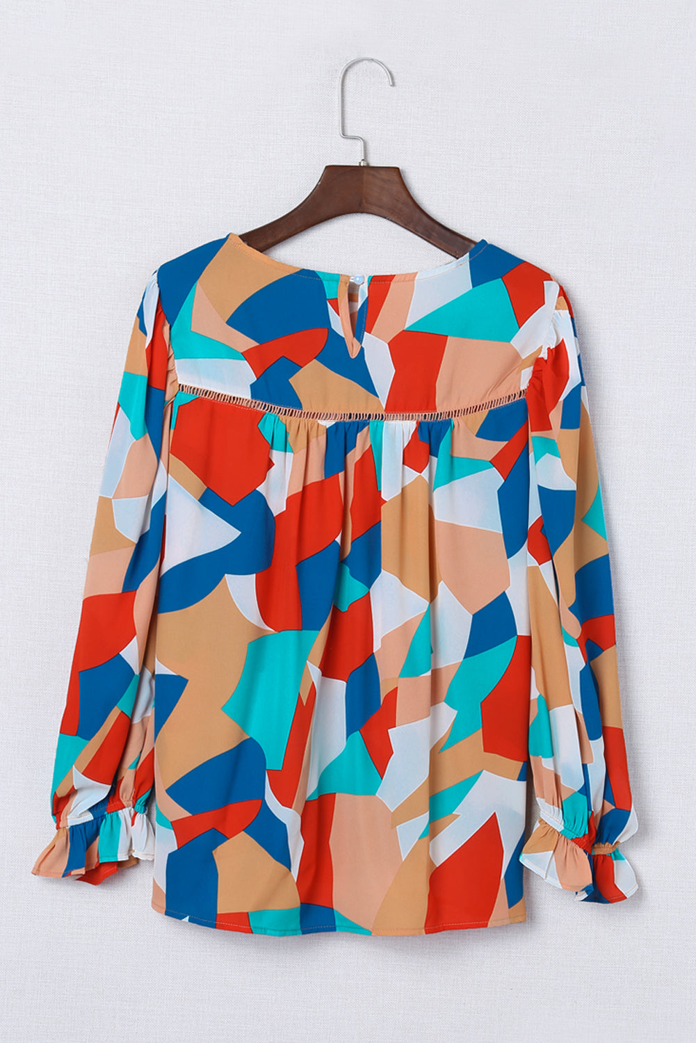 Multicolor Casual Abstract Print Puff Sleeve BlouseMaterial:100%Polyester



		•An artful abstract pattern bursts with bold color on this light and airy blouse.
	
	
		•Highlights: Relaxed fit, long sleeves with 