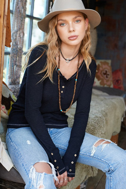 Leah TopA great wardrobe starts with solid basics, just like our Leah Top! This super soft jersey knit top has a classic button-down crew neckline, long sleeves- we added so