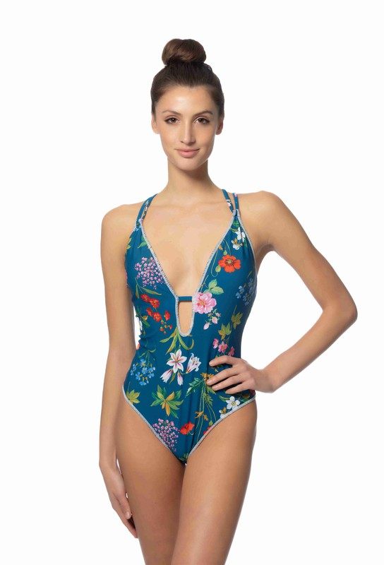 BLUE FLORAL ONE PIECE SWIMSUIT W/STITCHING DETAILSBlue floral one piece swimsuit featuring stitching trim, V-front neckline, removable padded cups, and adjustable crisscross-tie shoulder straps. Stretch material and