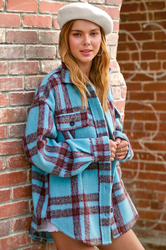 Vallis JacketA striking and versatile check-patterned jacket that effortlessly combines style and comfort. This jacket features a captivating check pattern and is designed with a