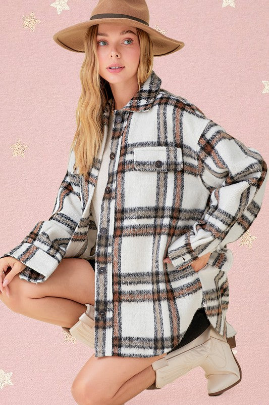 Vallis JacketA striking and versatile check-patterned jacket that effortlessly combines style and comfort. This jacket features a captivating check pattern and is designed with a